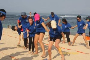 stepping mat games, beach team building, expedia group