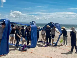 Bulldozer Game - Wolters Beach Team Building bulldozer games, amazing race, beach games, beach team building, Wolters Kluwer Group