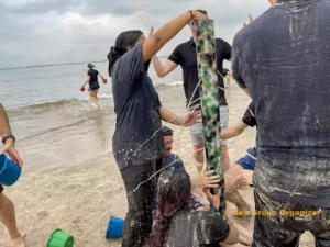 Bali Beach Water Game - Fluence Energy Group fluence energy, fluence energy group, fluence energy group event, beach team building, bali beach team building, bali water games, water tower game