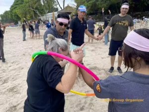 Hula Hoop Transfer - Fluence Energy Group fluence energy, fluence energy group, fluence energy group event, beach team building, bali beach team building, hula hoop transfer game