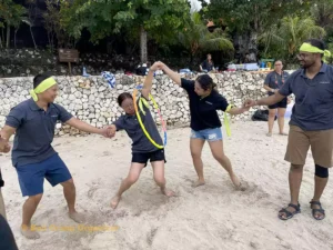 Hula Hoop Beach Team Building - Fluence Energy Group fluence energy, fluence energy group, fluence energy group event, beach team building, bali beach team building, hula hop transfer game