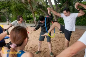 Aurecon Group Experience Hula Hoop Game - Bali Beach Team Building hula hoop game, aurecon, aurecon group, beach team building, bali team buidling, incentive trip to bali