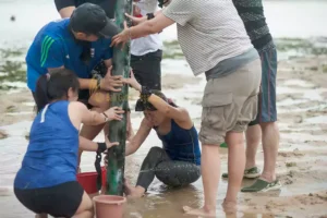 Aurecon Group Struggling on Water Tower Game - Bali Beach Team Building struggle on water towr game, aurecon, aurecon group, beach team building, bali team buidling, incentive trip to bali