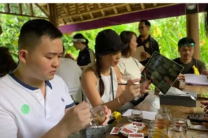 DBS Bank Group, outdoor activity, bali team building, bali event planner, coffee plantation, balinese heritage, bali culture