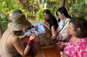 DBS Bank Group, outdoor activity, bali team building, bali event planner, bali adventure, bali group activity, coffee plantation, balinese herb tea