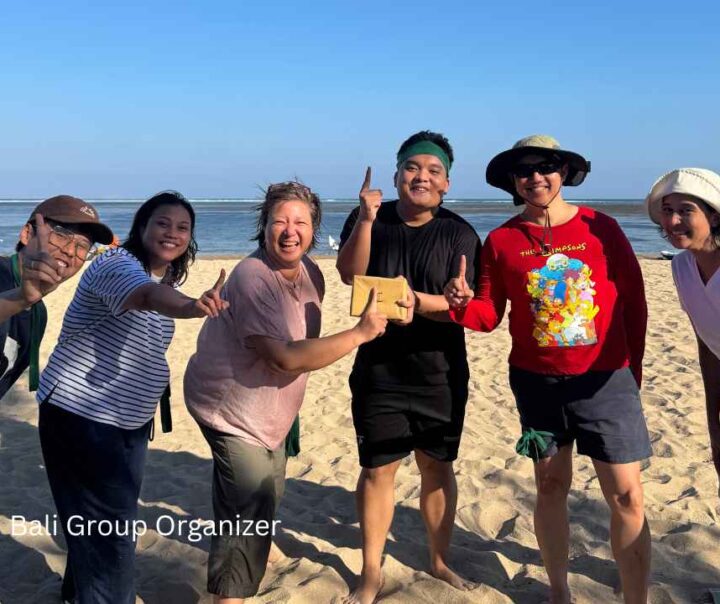 GBPN Indonesia team celebrating during beach team building activities in Bali